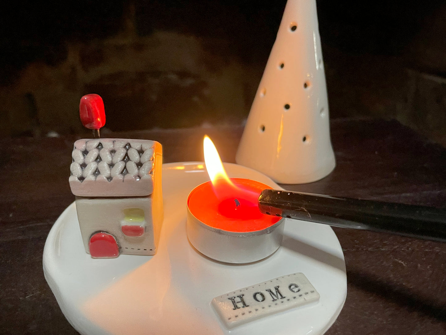 Scandinavian-style handmade ceramics Christmas decor with cottage and tea light holder tree