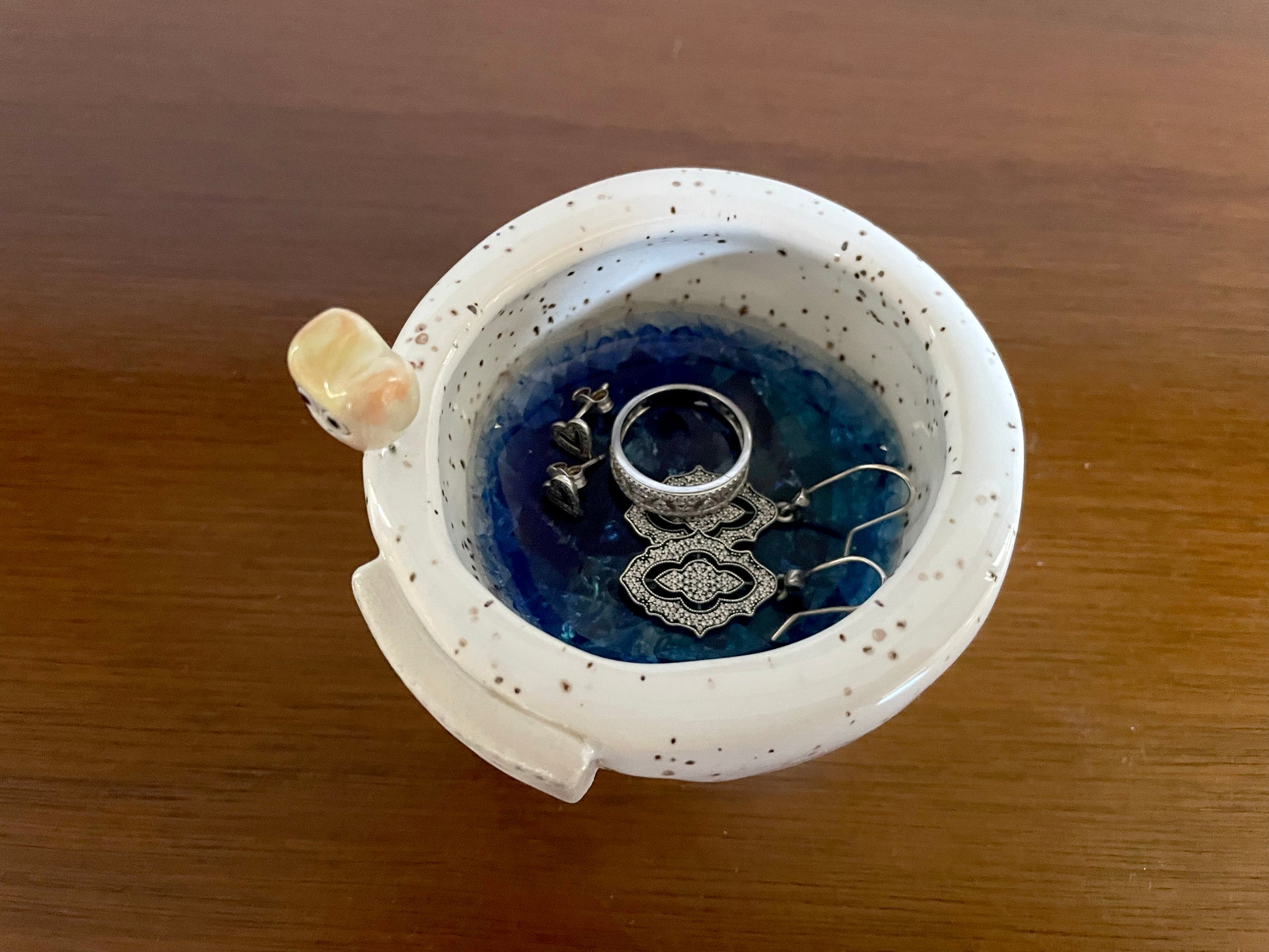 Jewelry holder, Cozy handmade ceramic décor piece glowing with tea light on holiday table.